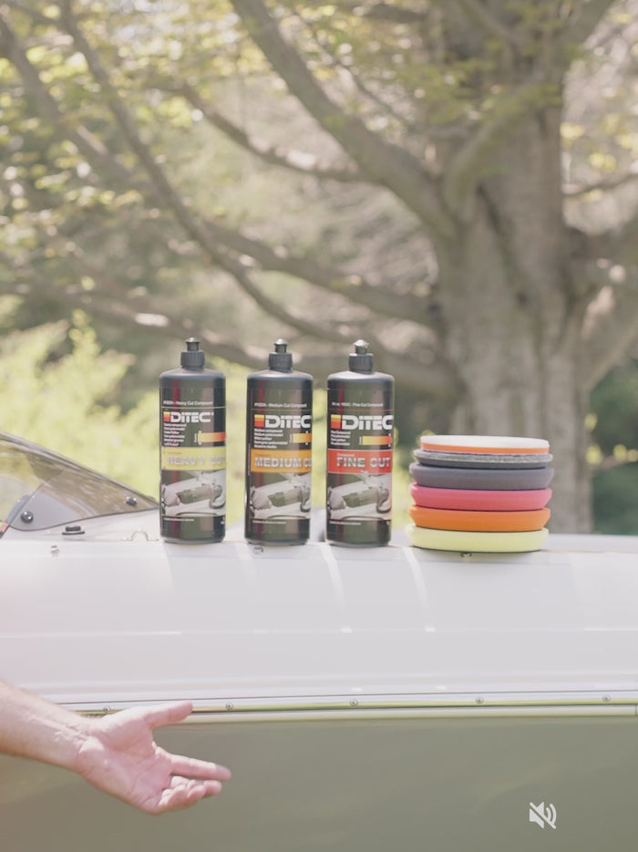 man using polishing compound for boats