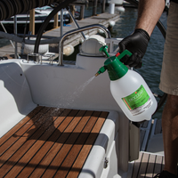 Spray bottle of bioclear disinfectant for your boat being used on teak